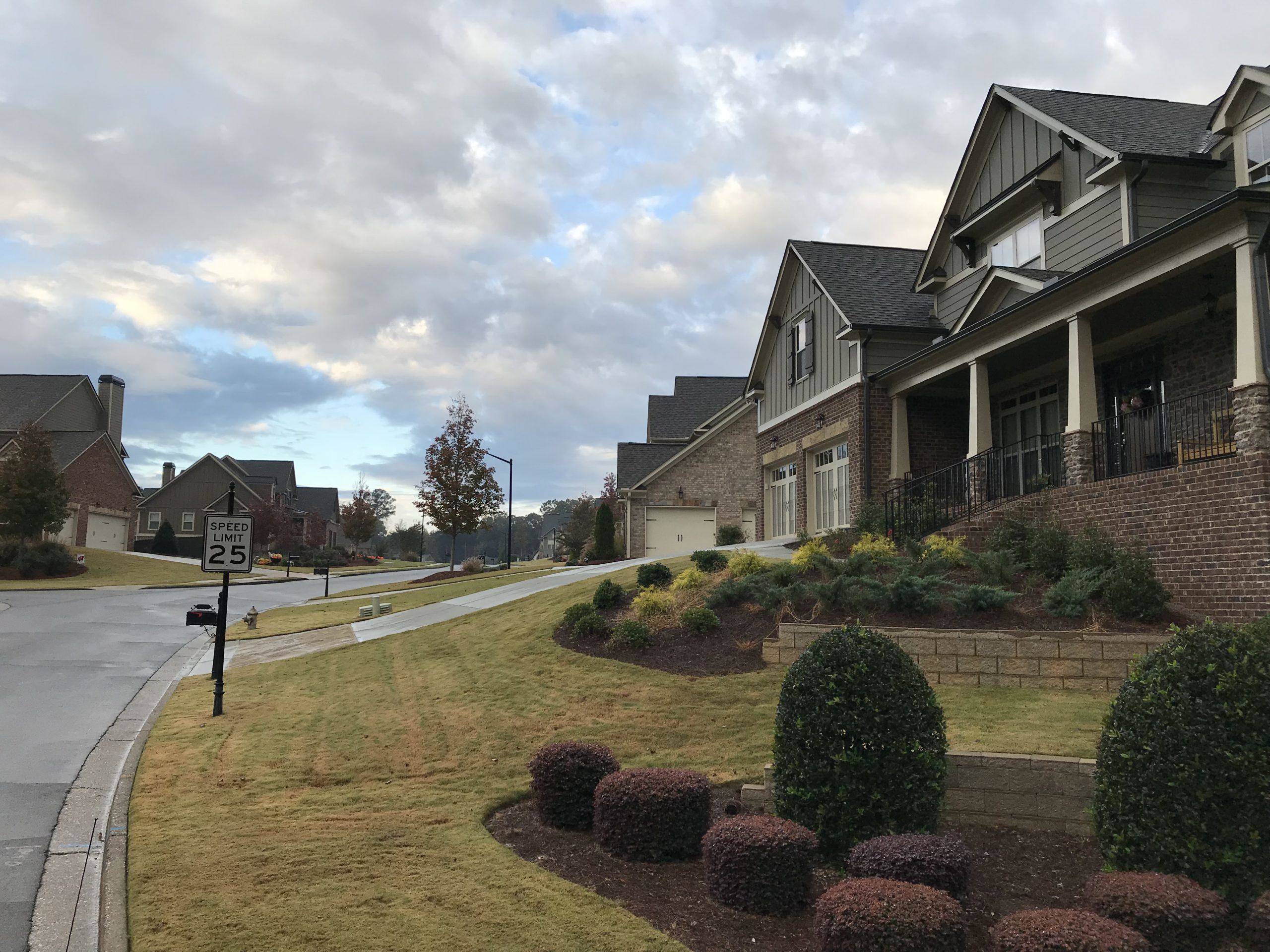 steep-driveway-solutions-to-avoid-bottoming-out-your-car-curb-ramp