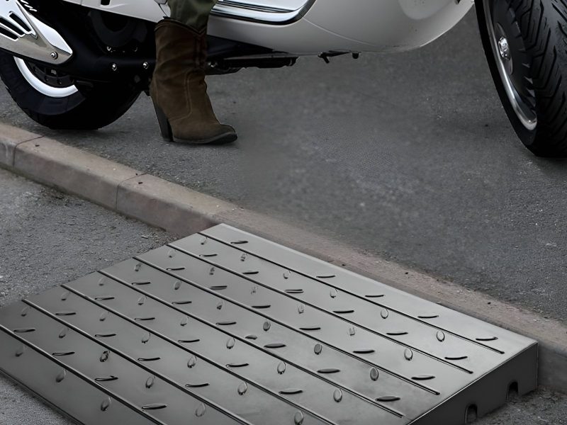 Rubber ramp for improved scooter & motorcycle clearance