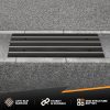 Rubber driveway curb ramp with anti-slip surface, designed to bridge a street gutter and prevent low car scraping.