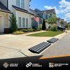 Driveway curb ramps installed to prevent car scraping on a low-clearance vehicle entry.