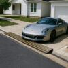 Rolled Curb Driveway Ramp – Low Car Clearance Scrape Prevention Low car using rolled curb driveway ramp to prevent scraping at steep entry
