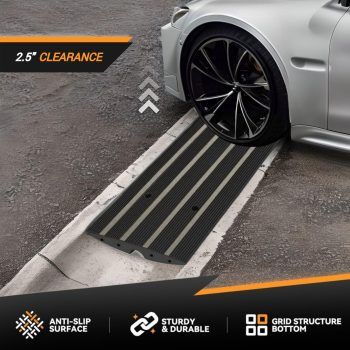 A rubber curb ramp providing 2.5 inches of clearance to prevent a low car from scraping on a street gutter.