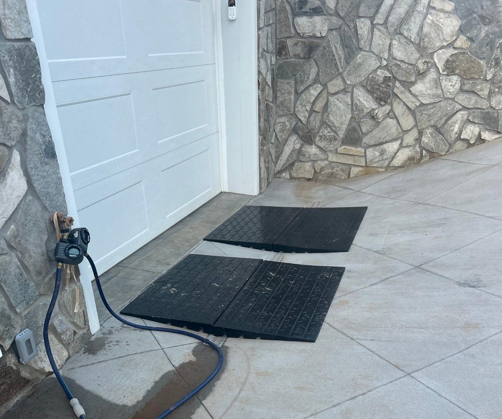 Garage Entry Ramp for Steep Driveway Lip – Prevent Scraping Over French Drain Garage threshold ramp for steep driveway lip and French drain transition preventing car scraping