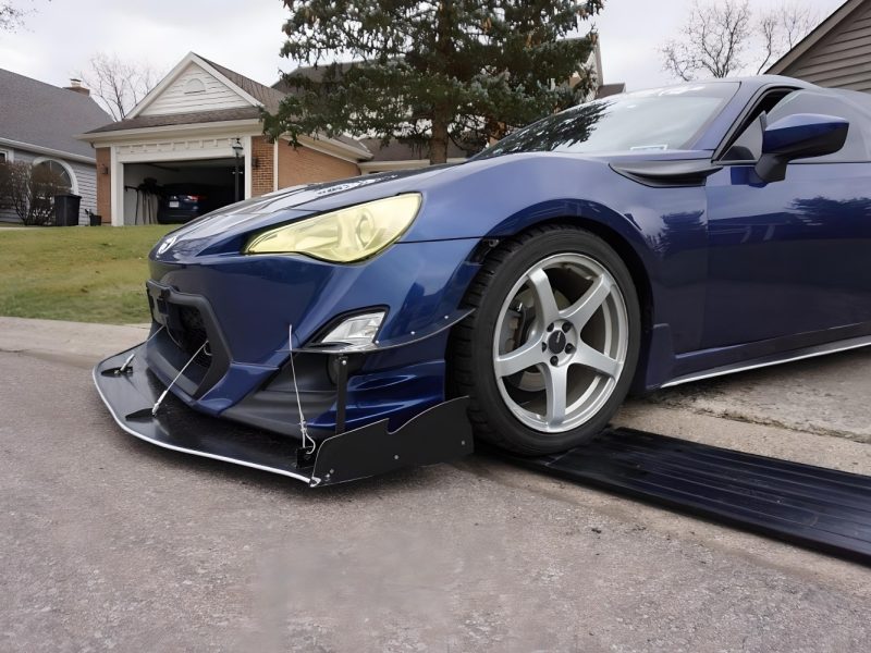 Curb ramp solution for low cars