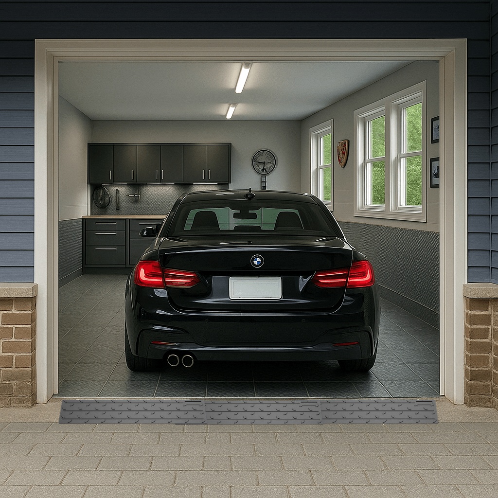 Garage Entry Ramp for Threshold Lip Clearance and Smooth Transition Low car backing into a garage using a rubber entry ramp that smooths the raised garage lip.