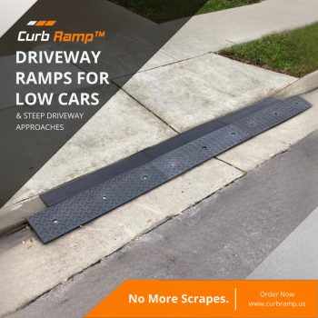 A straight curb driveway ramp installed to prevent low-clearance vehicles from scraping while crossing the curb.