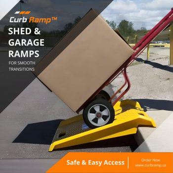 Yellow ramp being used to move a hand truck up a curb.