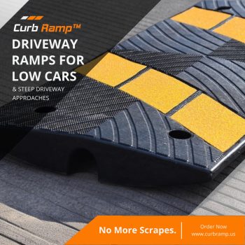 Close-up of a driveway ramp designed to prevent low-clearance vehicles from scraping on steep driveway curbs.