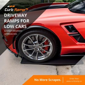 Low profile driveway ramps preventing splitter scraping for a red sports car on steep approaches