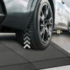 Close-up of a vehicle wheel using a QuickLift Ramp Kit for safe curb and driveway clearance.