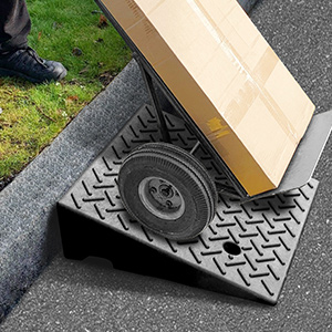 Heavy duty rubber loading ramp used to move a hand truck over a curb