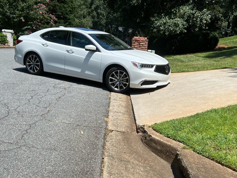 Car Scrapes on Steep Driveway - Driveway Solutions