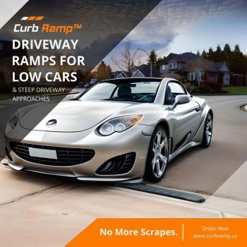 Sports car utilizing a curb ramp for a seamless transition over a driveway curb.