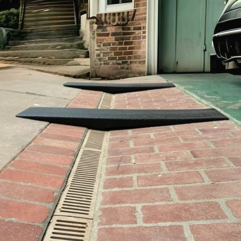 garage-entry-ramps-for-steep-decline-over-drain-gutter-into-garage