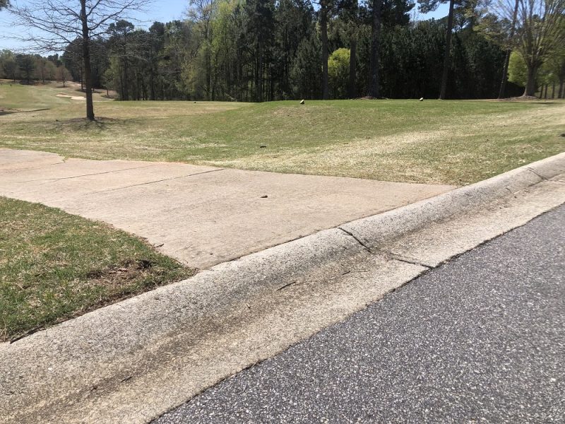 steep-rolled-curb-solution-for-driveway-and-golf-cart-path