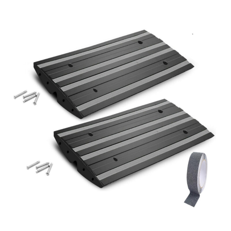 Two compact black rubber driveway curb ramps with mounting bolts and grip tape for low car clearance and curb transitions