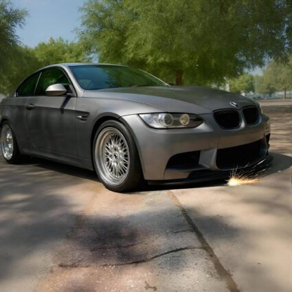 Low car front splitter scraping on a rolled curb driveway dip
