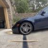 sports-car-scraping-garage-entry-french-drain-steep-driveway-dropoff-low-clearance-solution